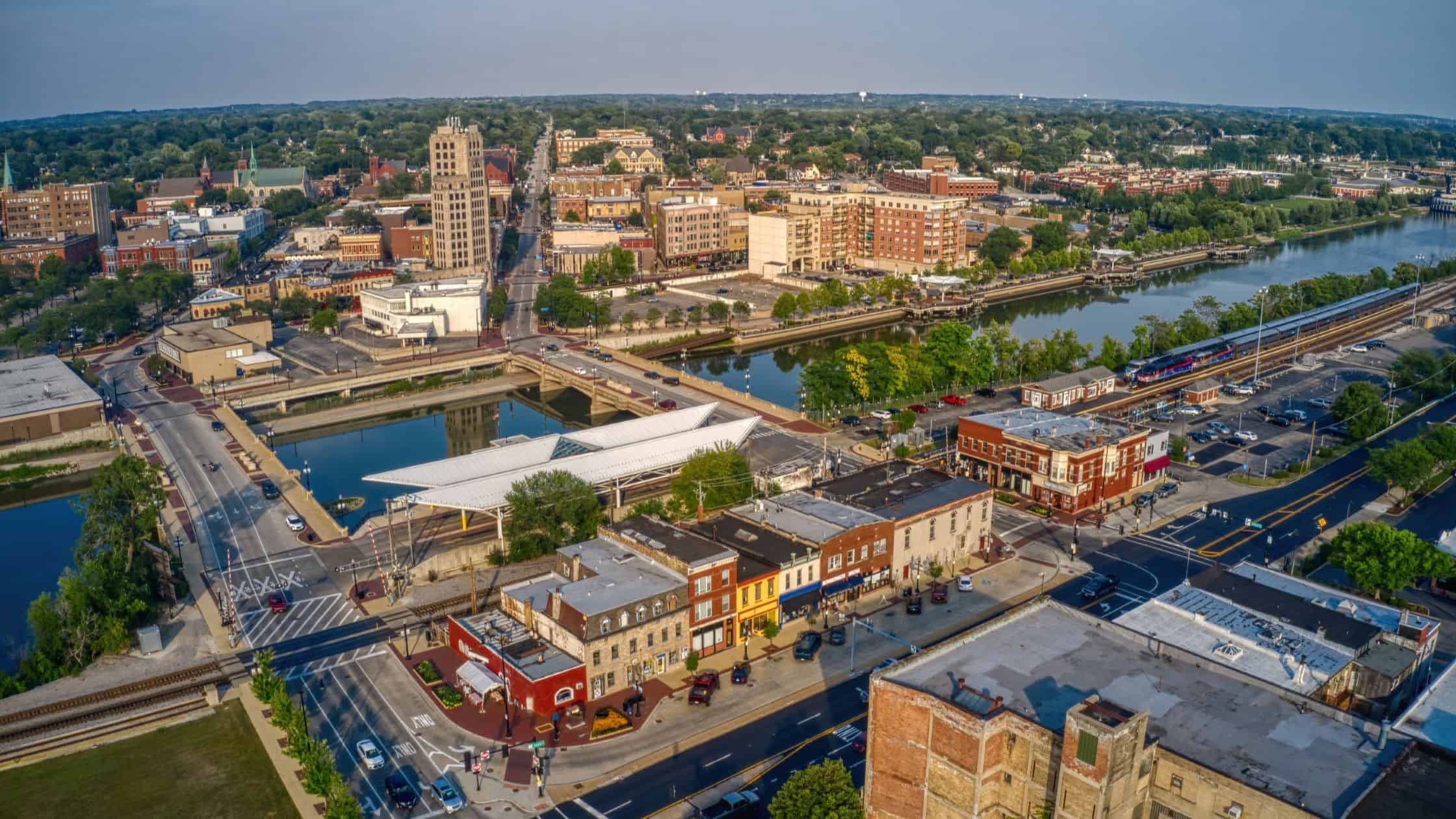 Elgin, Illinois Aerial Photo – Downtown, Fox River, and Metra Station